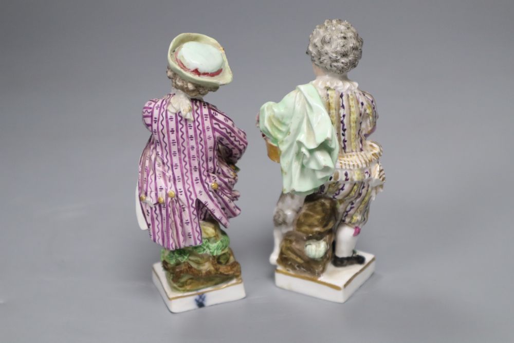 A pair of Meissen porcelain figures, height 10cm (damaged)